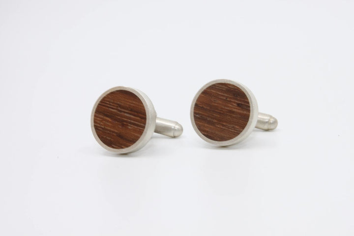 Rosewood cufflinks set in brushed sterling silver.