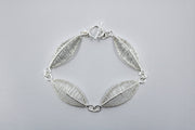 Petal bracelet, hand-woven in sterling silver.   8.5" long
