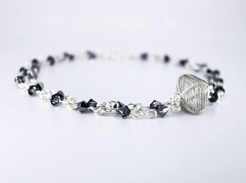 The Ol’ Razzle Dazzle necklace, hand-woven in sterling silver and Swarovski 17.5" long