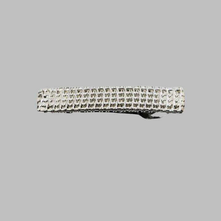 Hand-woven sterling silver mini barrette.  1.5” long