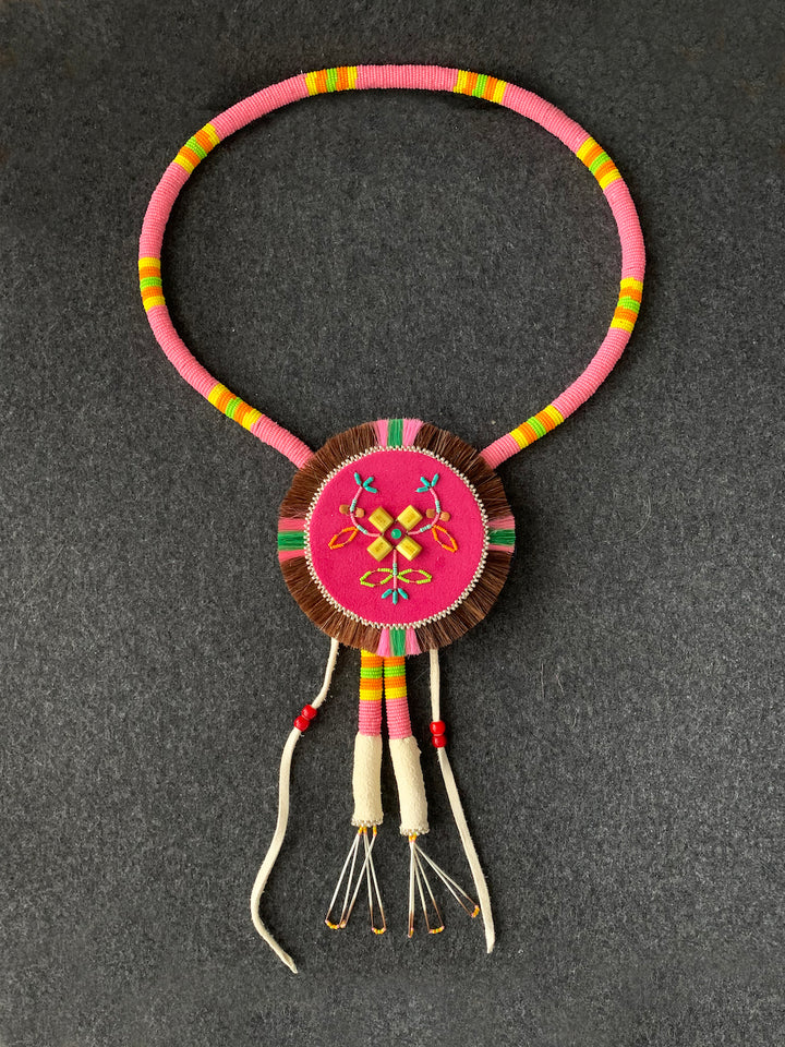 Spirit Berry Bling (2022), mixed media. With a tie at the back, the length of this neckpiece is adjustable.