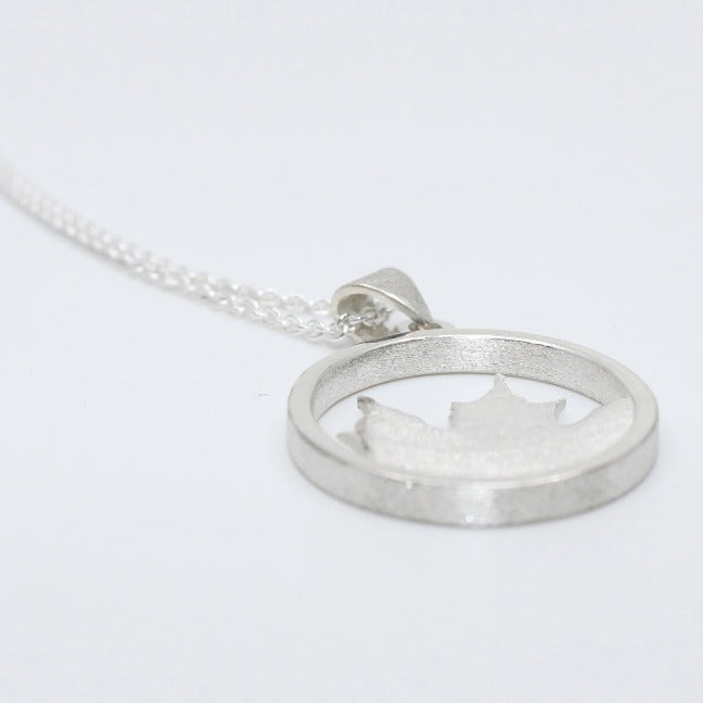 Maple leaf pendant in sterling silver is a subtle suggestion of a living maple leaf. by Allyson Simmie.