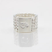 Sterling silver woven ring with an om symbol in a size 6.5