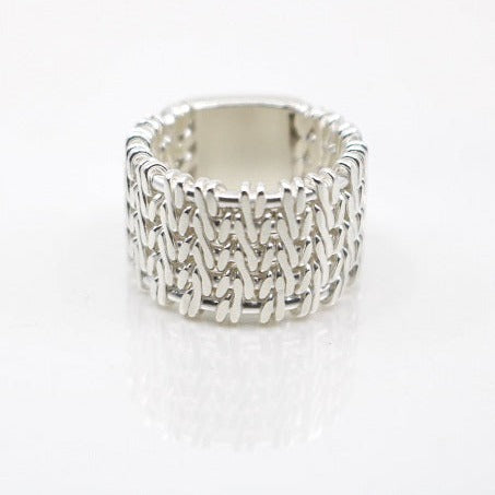 Sterling silver woven ring with an om symbol in a size 6.5