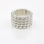 Sterling silver woven ring with an om symbol in a size 6.5