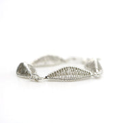 Petal bracelet, hand-woven in sterling silver. 