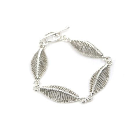 Petal bracelet, hand-woven in sterling silver. 