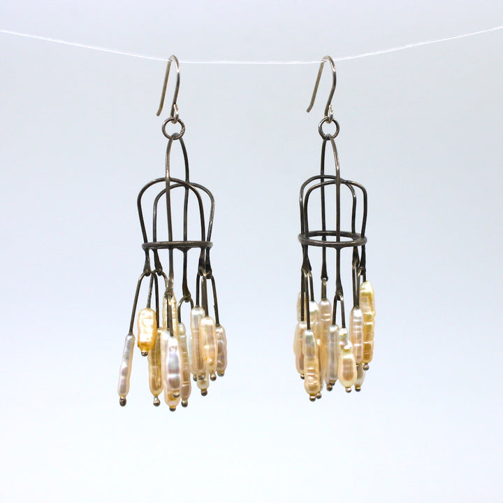 Lydia Buxton Drop earrings in oxidized sterling silver with freshwater pearls.