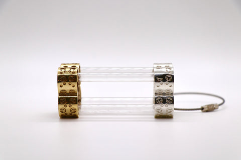 Hourglass-Shaped Belt Accessory - Cast silver and bronze inspired by a marble maze game, with stainless steel chain and plastic tubes.