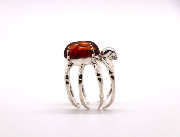 Spider - Cast silver ring in the shape of a spider, with an amber stone.Spider - Cast silver ring in the shape of a spider, with an amber stone.