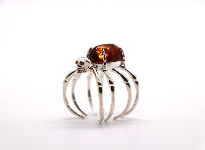 Spider - Cast silver ring in the shape of a spider, with an amber stone.Spider - Cast silver ring in the shape of a spider, with an amber stone.