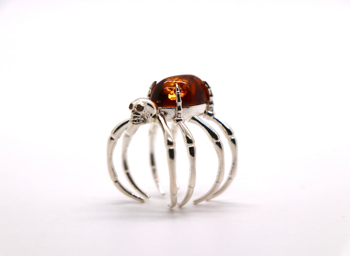 Spider - Cast silver ring in the shape of a spider, with an amber stone.Spider - Cast silver ring in the shape of a spider, with an amber stone.