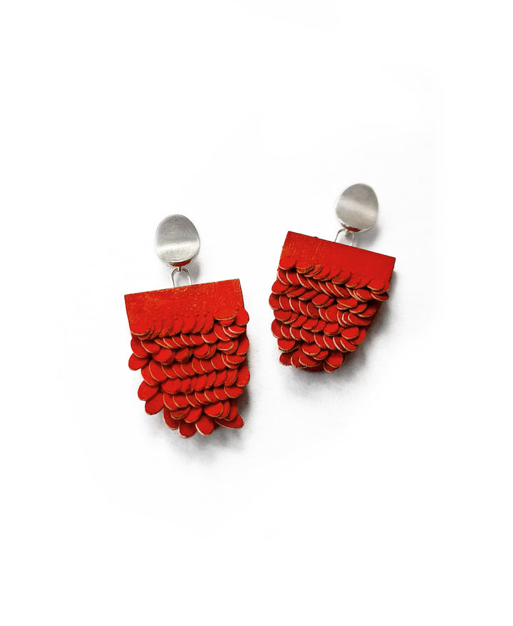 Red half oval earrings, made from sterling silver, wood, paper, cotton and pigments   2.8 x 5 x 0.6 cm each 