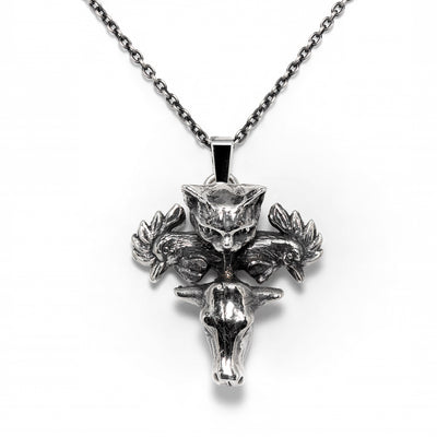 Melissa: From the Nous Les Animaux series, this little sterling silver pendant is totem of different creatures, depicting a cat, a cow, and two roosters.