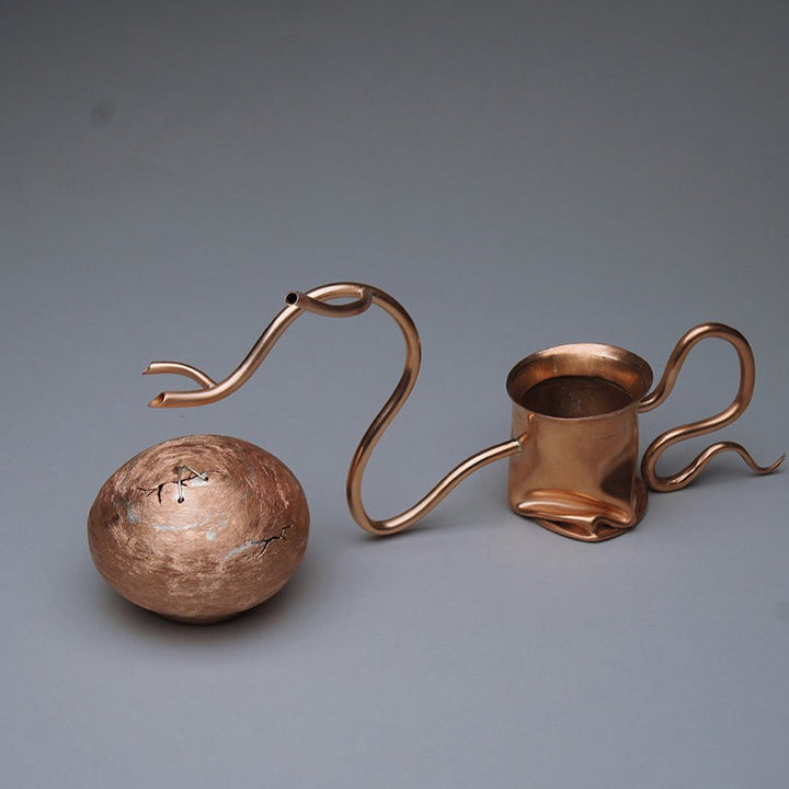 Artist: Rayce Min Title: Adulthood Object: teapot Materials: Copper, silver Technique: Deep draw forming, raising, forging, fabrication Dimensions: 29 x 8 x 15 cm