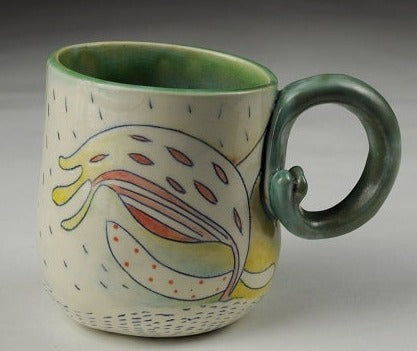 Colourful ceramic glaze mug in green