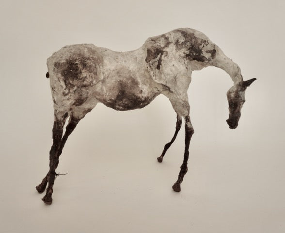 Myr III - 2022. Mixed-media sculpture of a horse made from paper and metal.