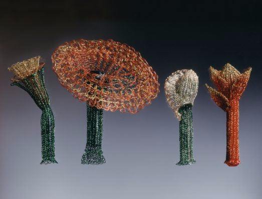 On Being Female brooches with coloured copper wire, copper, brass, spandex and tampons by Barbara Stutman.