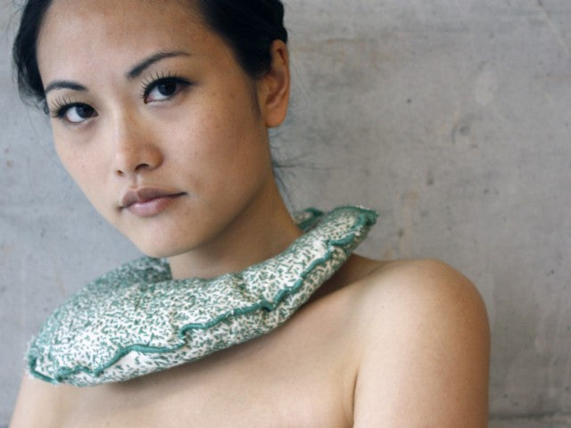 Fields neck piece in canvas, beading and leather by contemporary Canadian jewellery artist Rebecca Horwitz.