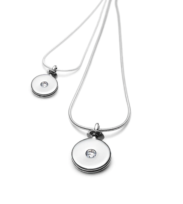 Bateau series pendant with cubic zirconium.  Matching stud earrings are available in two sizes. Currently on a 16"/40 cm chain, the pendant is 13 mm in diameter.