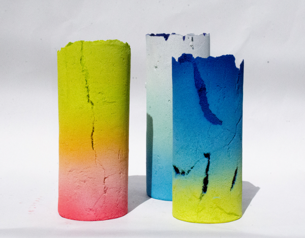 Shay Salehi Glass cylinder sculptures using the pâte de verre technique with applied pigment and glass beads.
