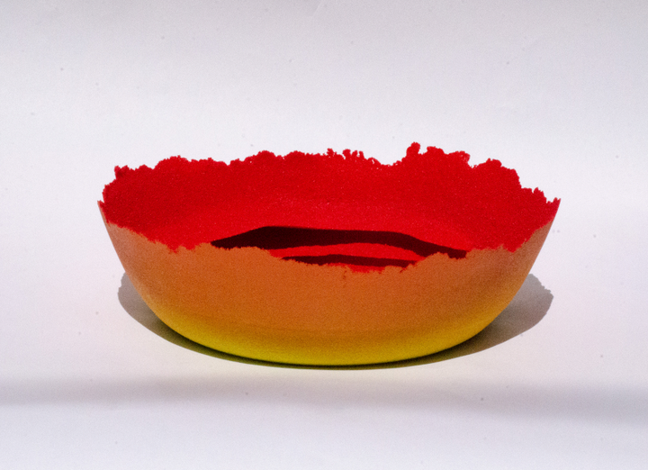 Shay Salehi Double edge glass bowl using the pâte de verre technique with applied pigment and glass beads.
