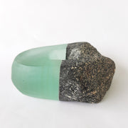From the Lake and Land series, a small sculptural vase of stone and repurposed plate glass in which the natural and urban worlds are fused together. 