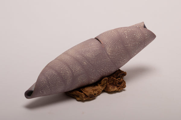 Small shell 1 - porcelain textured shell sculpture in a light purple shade  22l x 7.5h x 6d cm