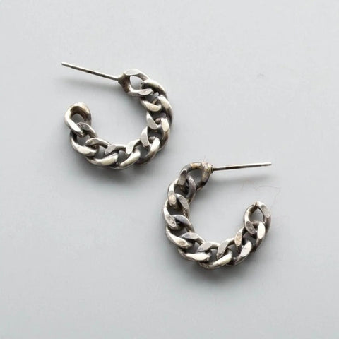 Matte oxidized stud earrings are transformed salvaged chains hand-fabricated into hoops. 