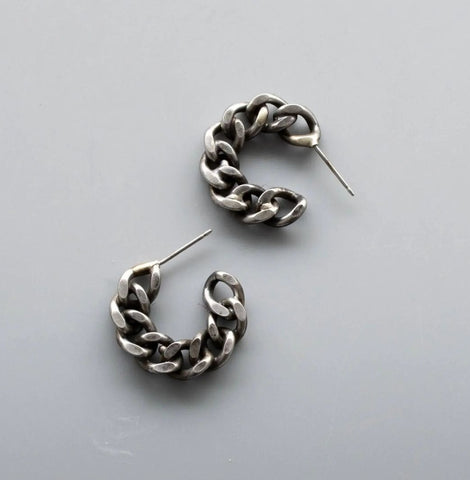 Matte oxidized stud earrings are transformed salvaged chains hand-fabricated into hoops. 
