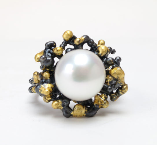 Tides Ring.   Sterling silver, patina, gold leaf sealed with resin, 9mm round freshwater pearl.