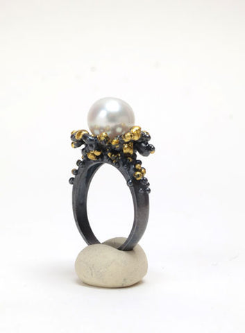 Tides Ring.   Sterling silver, patina, gold leaf sealed with resin, 9mm round freshwater pearl.
