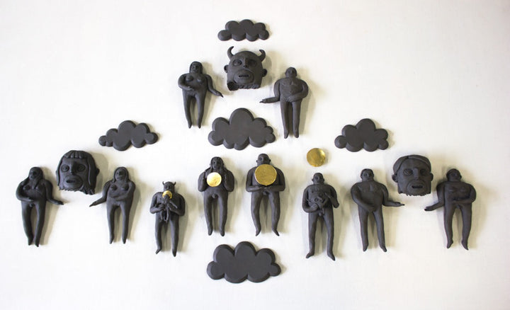 False Testimonies. Ceramic with gold leaf wall sculpture composed of 19 variable elements, this installation measuring 64 x 104 x 4 cm. 