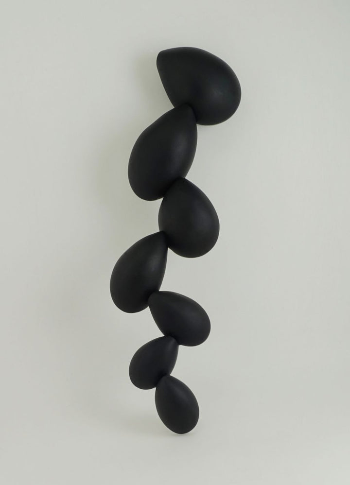 Black rounded sculpture