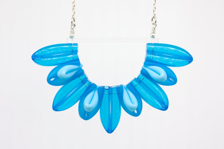 Week 45 Necklace in blue silicone, acrylic, on 18" sterling silver chain.