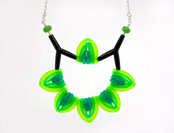 Week 46 Necklace in green silicone, handmade glass beads, acrylic, on 18" sterling silver chain.