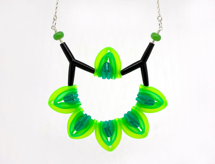 Week 46 Necklace in green silicone, handmade glass beads, acrylic, on 18" sterling silver chain.