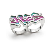 Vert et Violet, 2022 - Hand cut and riveted graffiti style double-ring made from sterling silver and anodized niobium on a lost wax base.  Size 10.5
