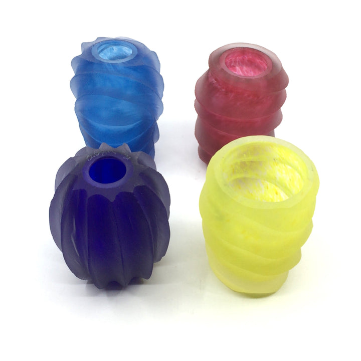 Small cylindrical glass candle holders in an assortment of bright and refreshing colours.  Each sold separately.  