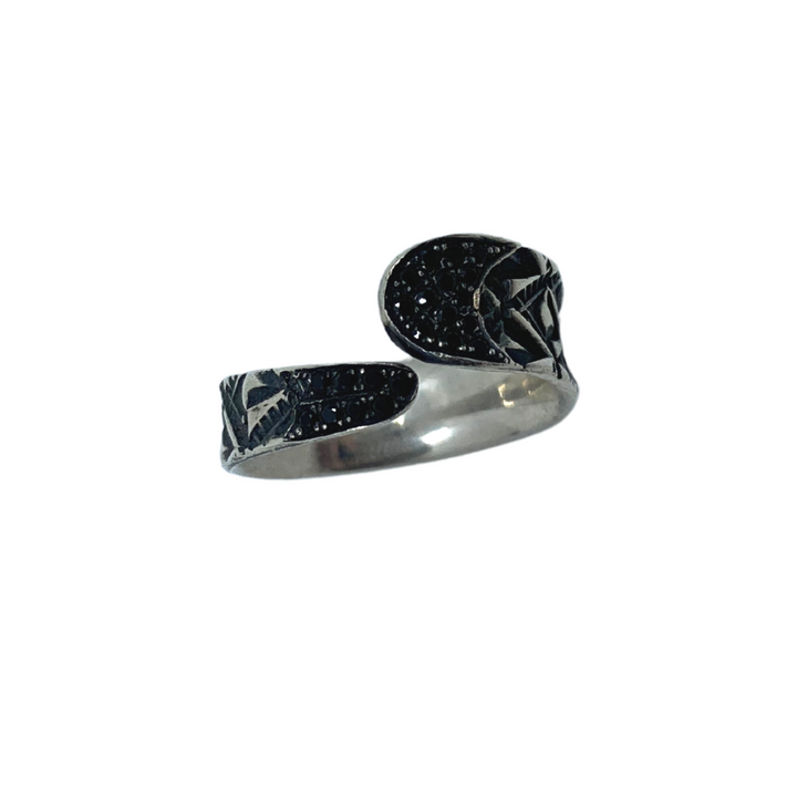 Hand stamped sterling silver ring with black spinels.   Size 6.5