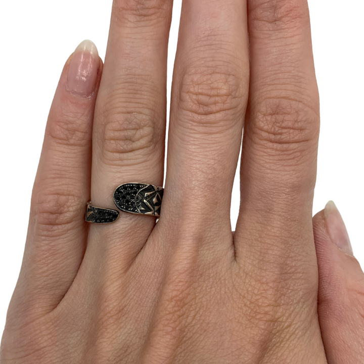Hand stamped sterling silver ring with black spinels.   Size 6.5