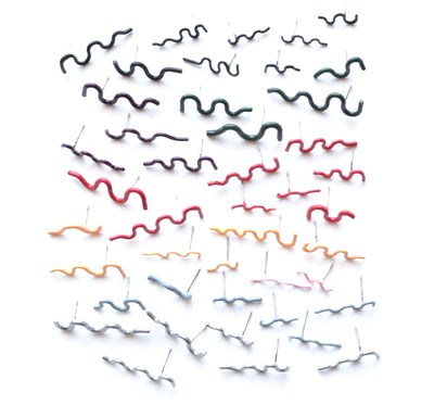 Squiggle stud earrings are colourfully powder coated copper on surgical stainless steel posts. Each is sold as a  single earring so different combinations are possible. We have a wide selection of colours in the gallery!