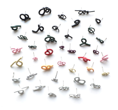 Twist Earrings are powder-coated copper on surgical stainless steel posts. Each earring is sold individually so you can mix and match a much as you like. We have a wide selection of colours and forms in the gallery!
