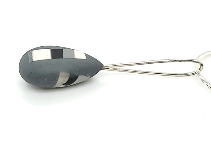 resin pedant, side view